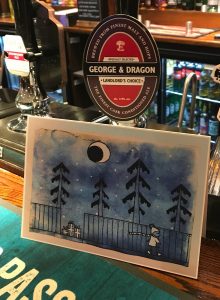 Izzy Perry's Christmas Card in the George & Dragon Heaton Chapel Greene King public house