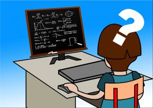 Girl doing maths on computer